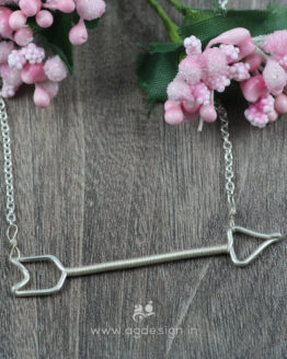 Arrow necklace sterling silver wooden background