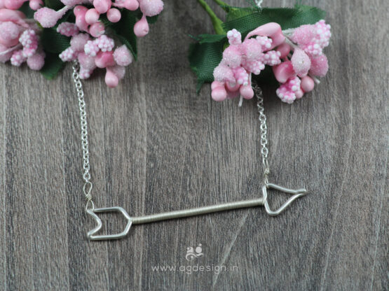 Arrow necklace sterling silver wooden background